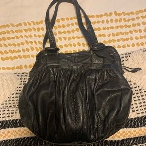 Cole Haan purse in black. Available.